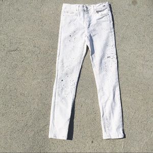Zara White skinny jeans with paint splatter,